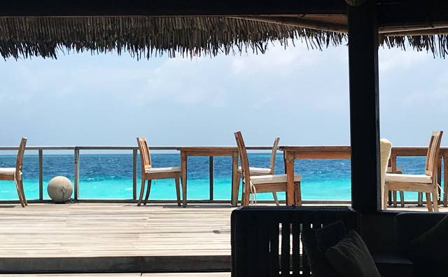 Decking in the bar area on a cloudy but hot day on Makunudu in the Maldives